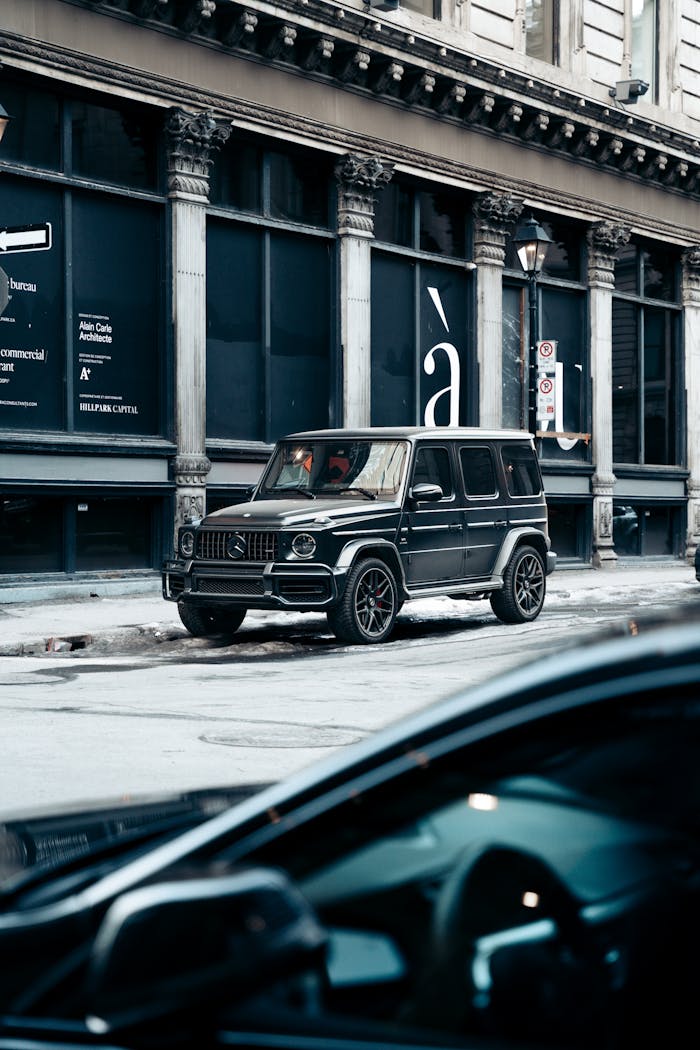 Mercedes-Benz G-Class parked on a stylish city street, reflecting urban elegance.